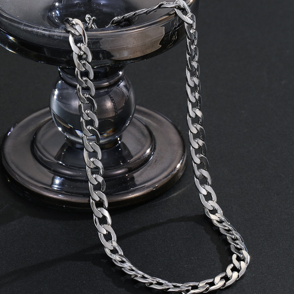 Fine Curb Chain - chain draped over stand