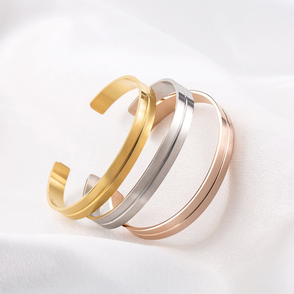 Groove Cuff - gold, silver and rose gold cuffs stacked