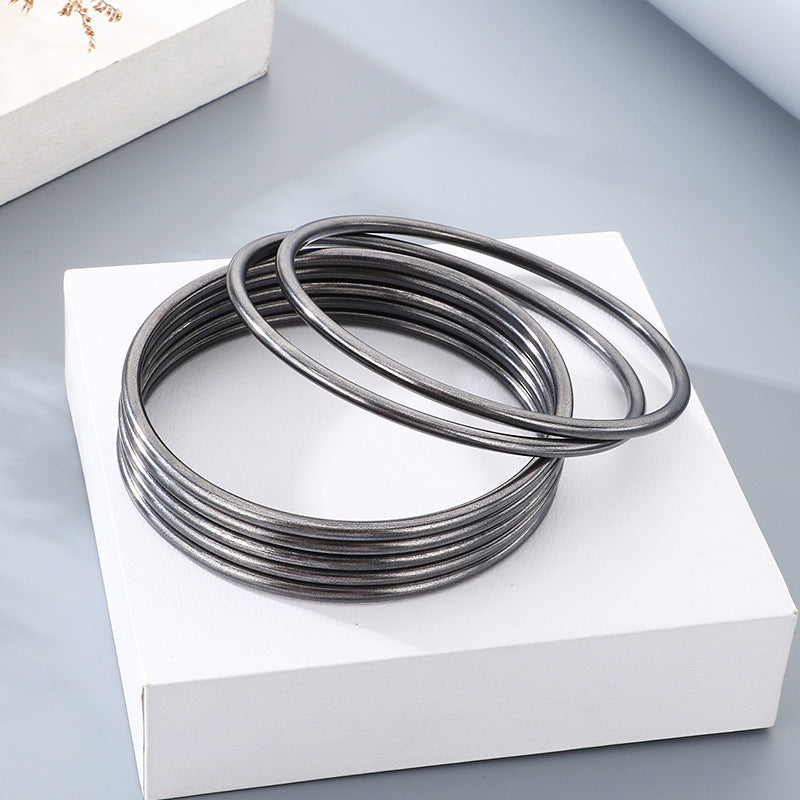 Noir Bangle - stack on white block