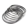 Noir Bangle - stacked black bangles on white background